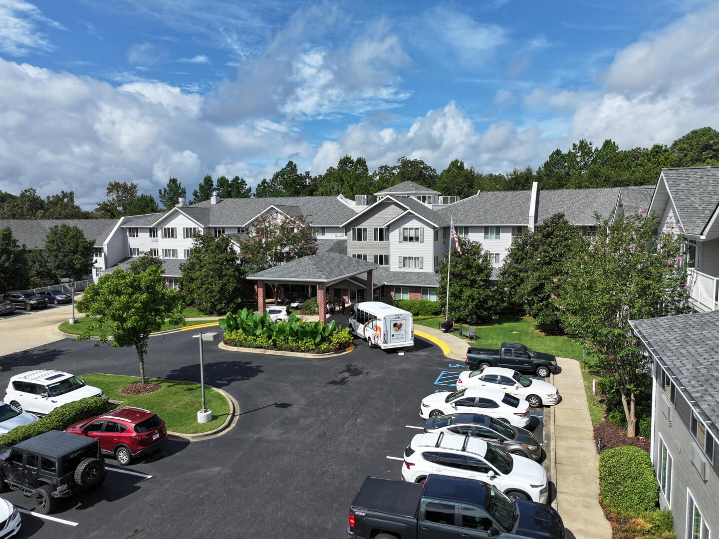 Modern Building Exterior With Covered Entry at Senior Living Apartments